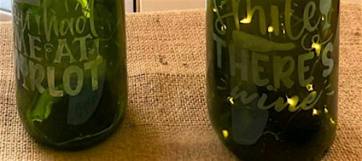 Quiet Glow: Etched Wine Bottles with Light